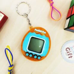 Pocket Pet - Porte Clé - Animal De Compagnie Numérique -cadeaux boutique pocket pet orange