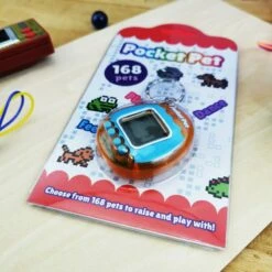 Pocket Pet - Porte Clé - Animal De Compagnie Numérique -cadeaux boutique pocket pet orange boite zoom