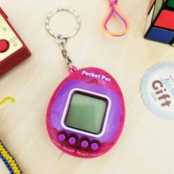 Pocket Pet - Porte Clé - Animal De Compagnie Numérique -cadeaux boutique pocket pet rose