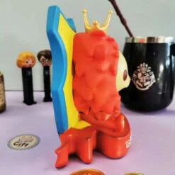 Figurine Tirelire Blason Gryffondor - Harry Potter - 16 Cm -cadeaux boutique tirelire lion gryffondor droite