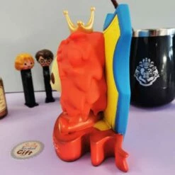 Figurine Tirelire Blason Gryffondor - Harry Potter - 16 Cm -cadeaux boutique tirelire lion gryffondor gauche